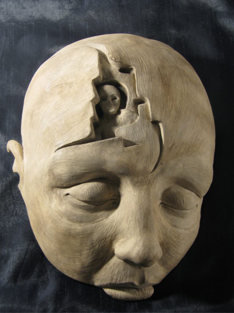 Dreaming hand made high bas relief clay sculpture